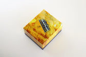 Saphir leather care product box with honeycomb design, ideal for shoe and leather conditioning