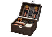 Luxury leather shoe care kit with brushes, creams, and polish for premium shoe maintenance