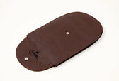 Saphir leather shoe shine pouch with pebbled texture and snap closure for premium shoe care