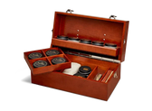Luxury wooden shoe care kit with Saphir products, brushes, and leather conditioning tools for premium shoe maintenance
