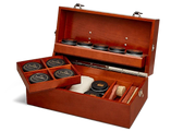 Luxury wooden shoe care kit with Saphir products, brushes, and cloths for leather conditioning and shine