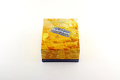 Saphir leather care product box with golden texture, ideal for shoe and leather restoration