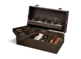 Luxury leather care kit with Saphir products, brushes, and polish in wooden box for shoe and bag restoration