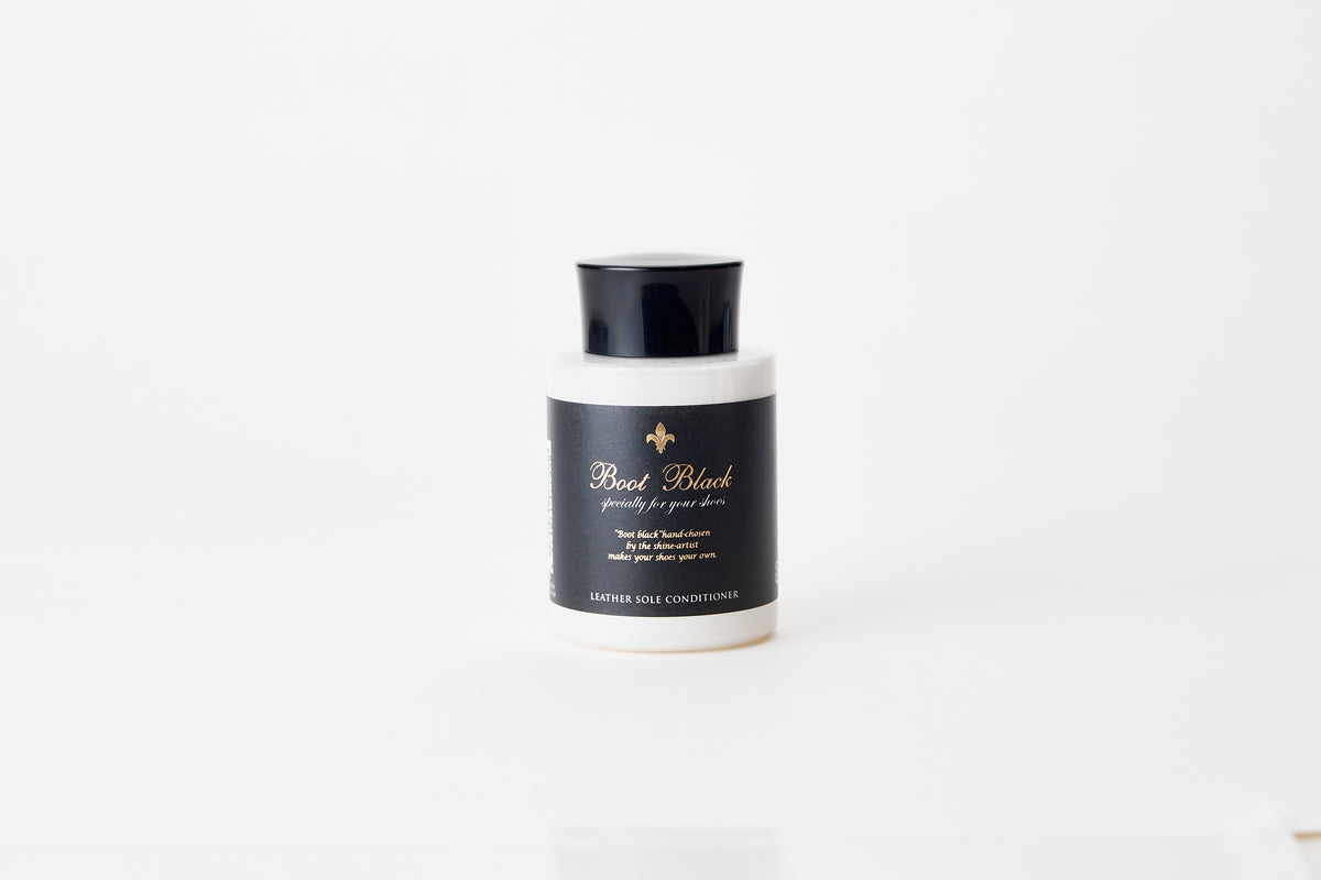 Boot Black Leather Sole Conditioner bottle on white background