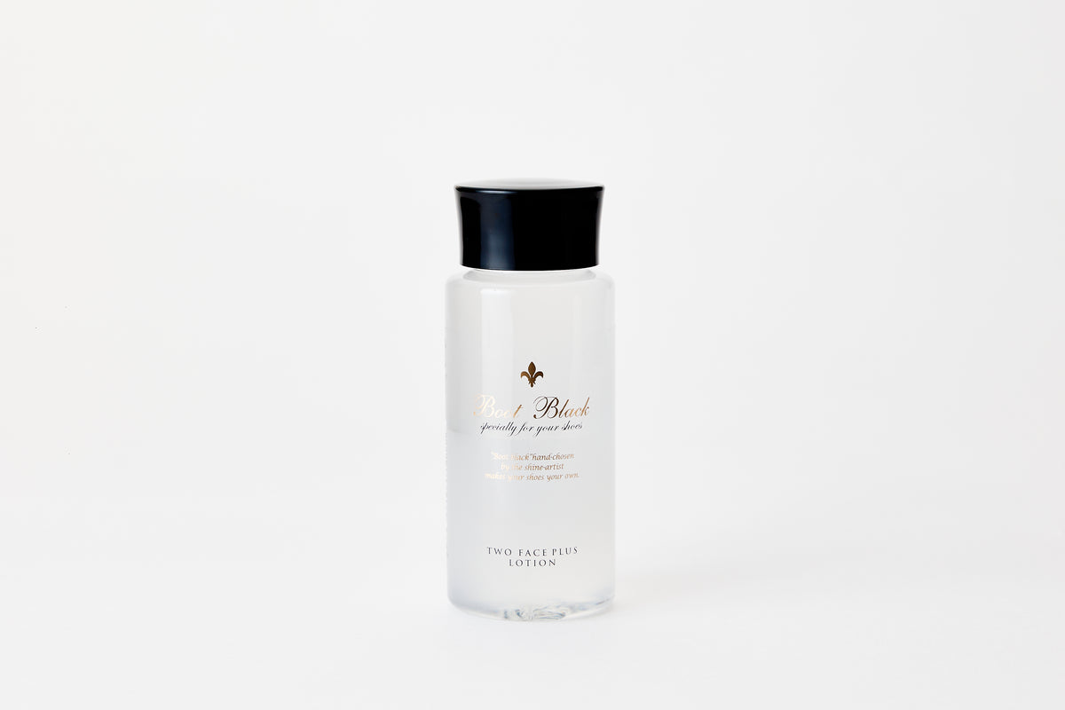 Boot Black Two Face Plus Lotion 100 ml bottle on white background