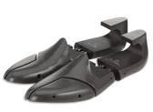 Black wooden shoe trees for leather shoe care and shape retention