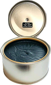 Black leather shoe cream in open metal tin, ideal for shoe repair and leather care