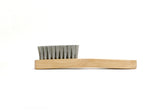 Columbus Stainless-Steel Suede & Nubuck Brush — side view of the stainless-steel bristles and beechwood handle