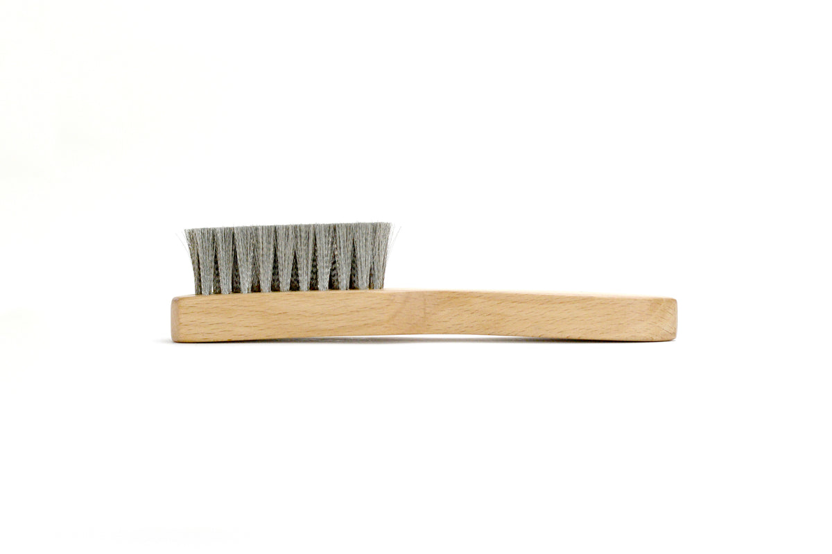 Columbus Stainless-Steel Suede & Nubuck Brush — side view of the stainless-steel bristles and beechwood handle