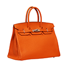 Orange leather handbag
